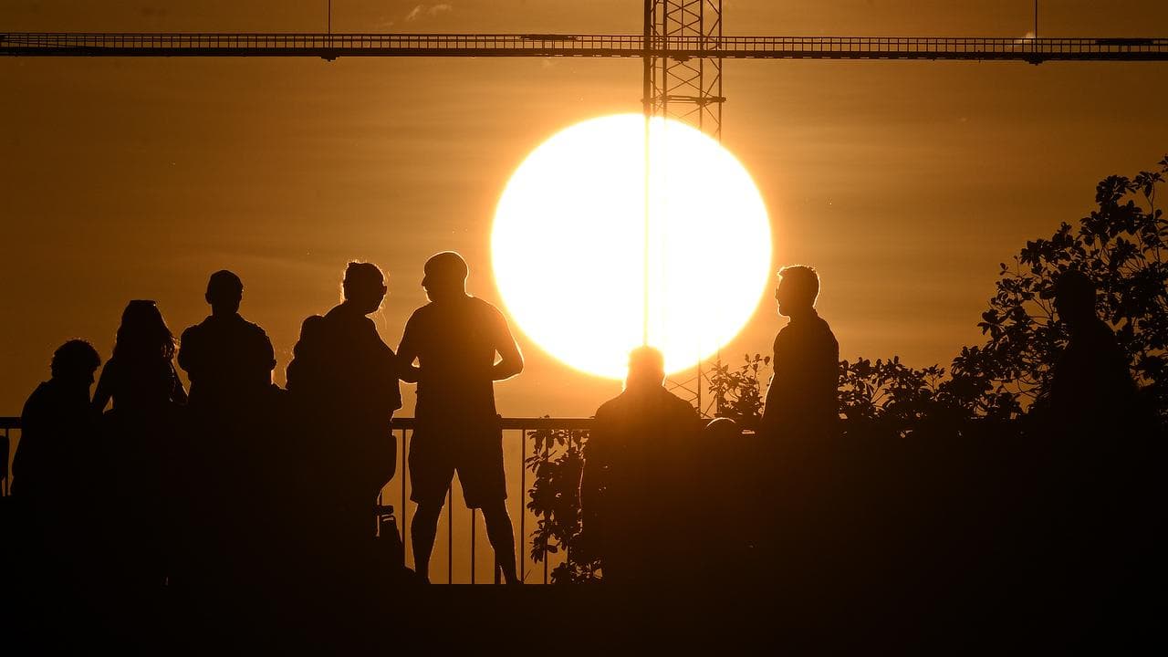 People during a sunset.
