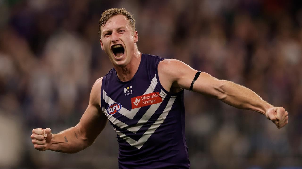 Josh Treacy of the Dockers celebrates