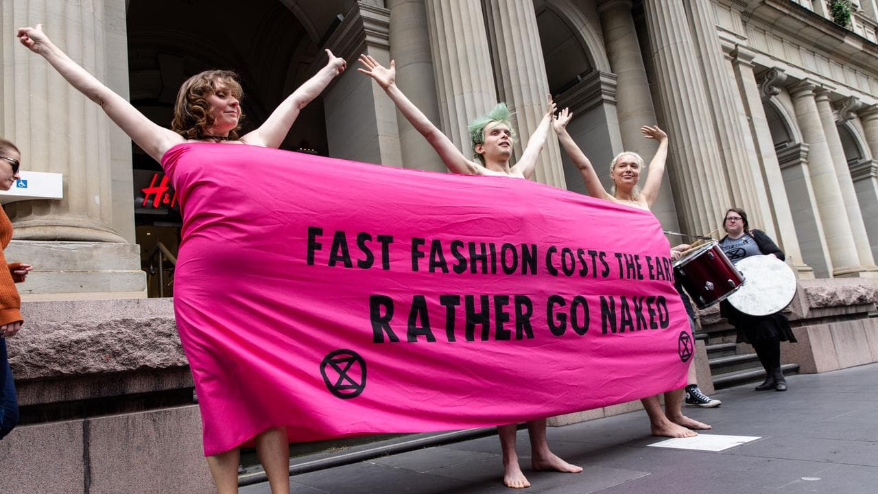 Activists wrapped with a banner (file)