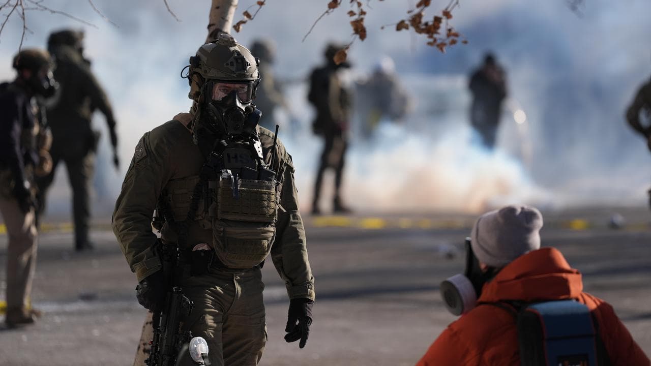 Federal immigration officers deploy tear gas
