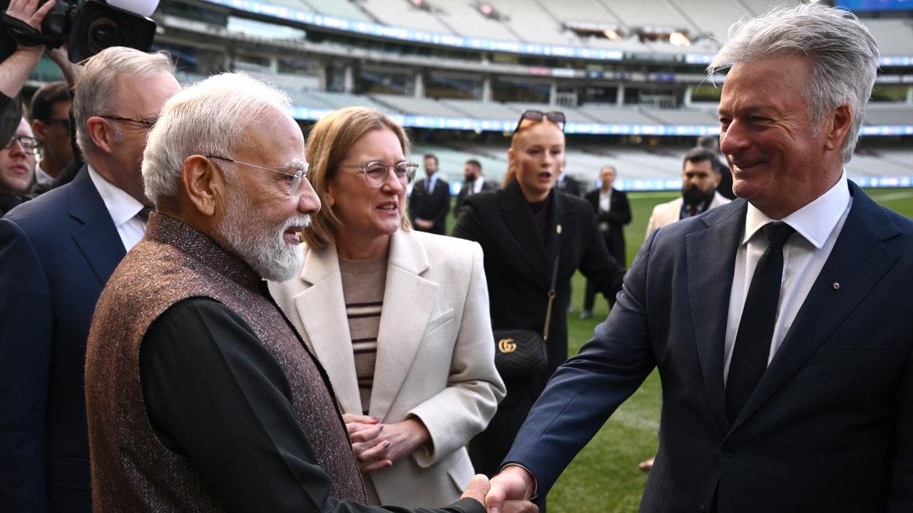 (L-R) Narendra Modi and Steve Waugh.