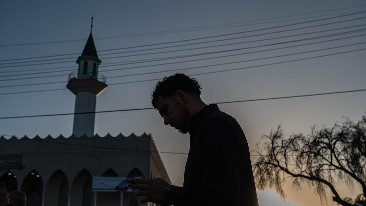 A photo of a worshippers at the Lakemba Mosque.