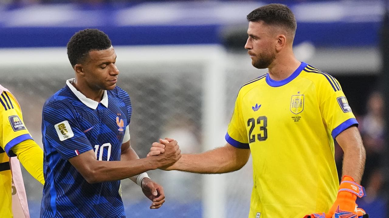 Kylian Mbappe and Unai Simon.