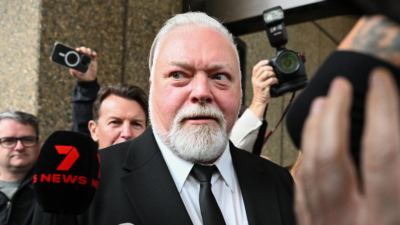Kyle Sandilands departs court (file image)