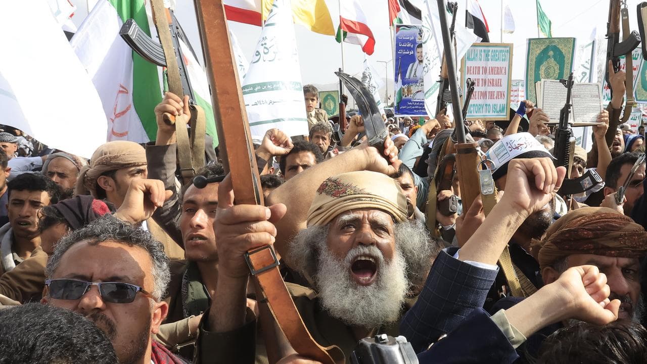 Houthi supporters in Sanaa protest against US air strikes on Iran