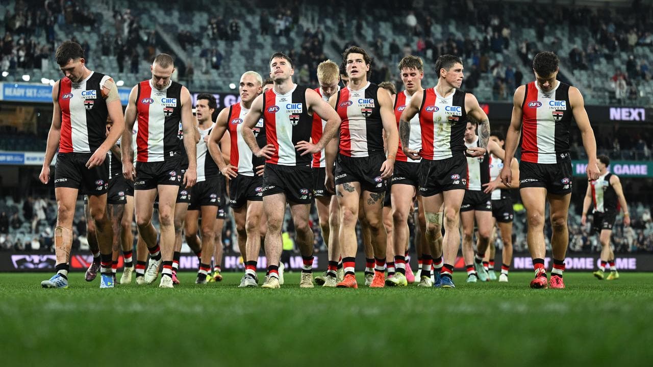 St Kilda players leave the field after their loss to Geelong.