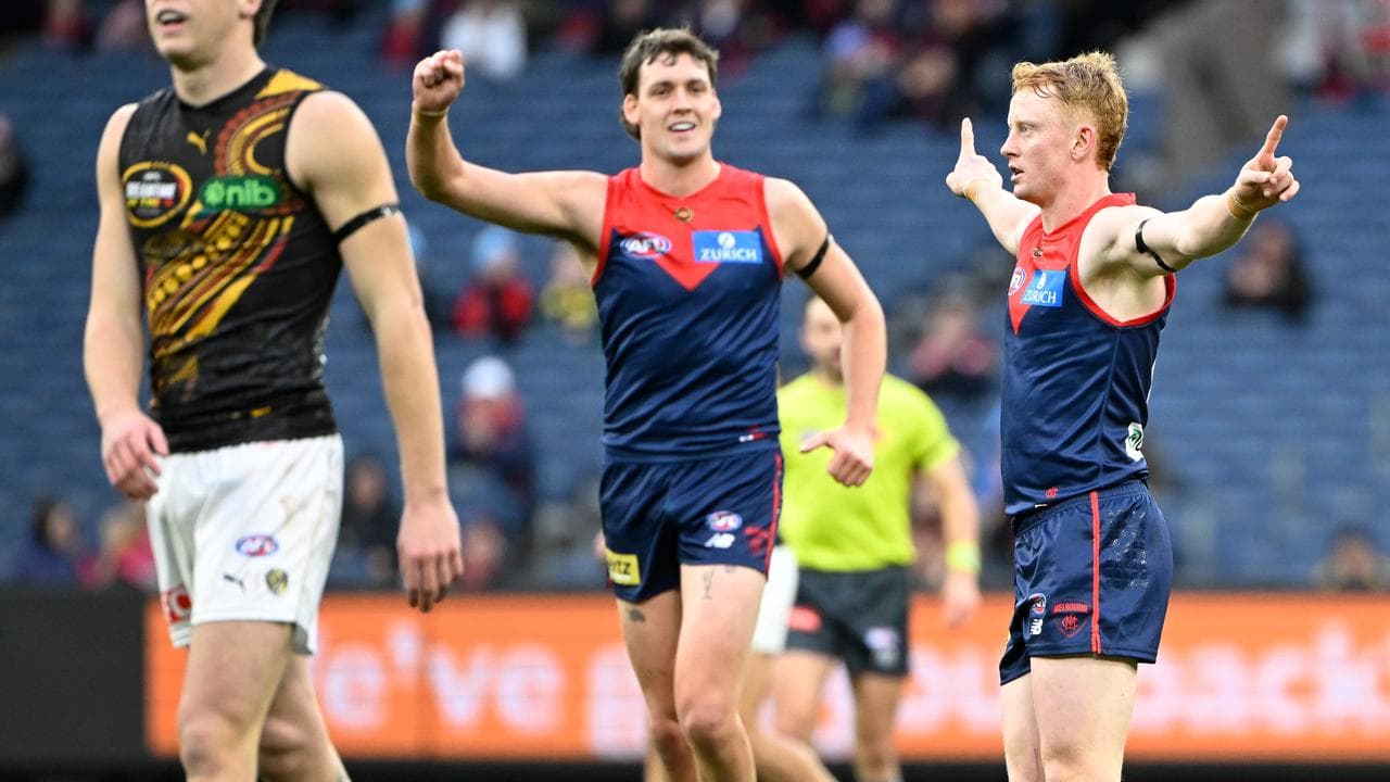 Celebrating Melbourne Demons players.