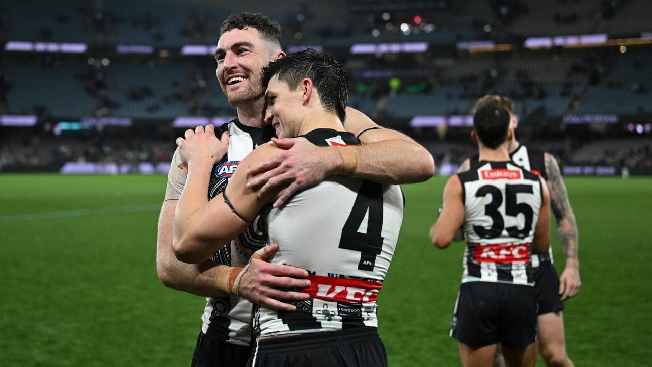 Celebrating Collingwood players.