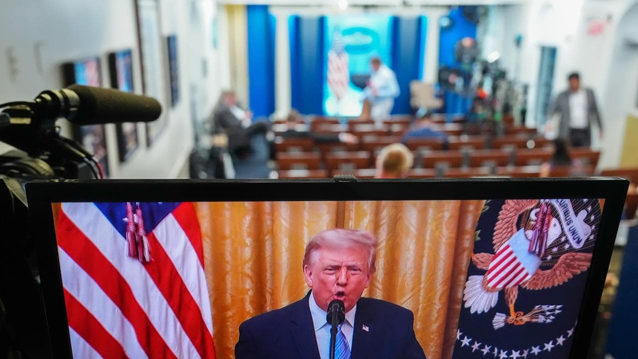 President Donald Trump is seen speaking from the White House