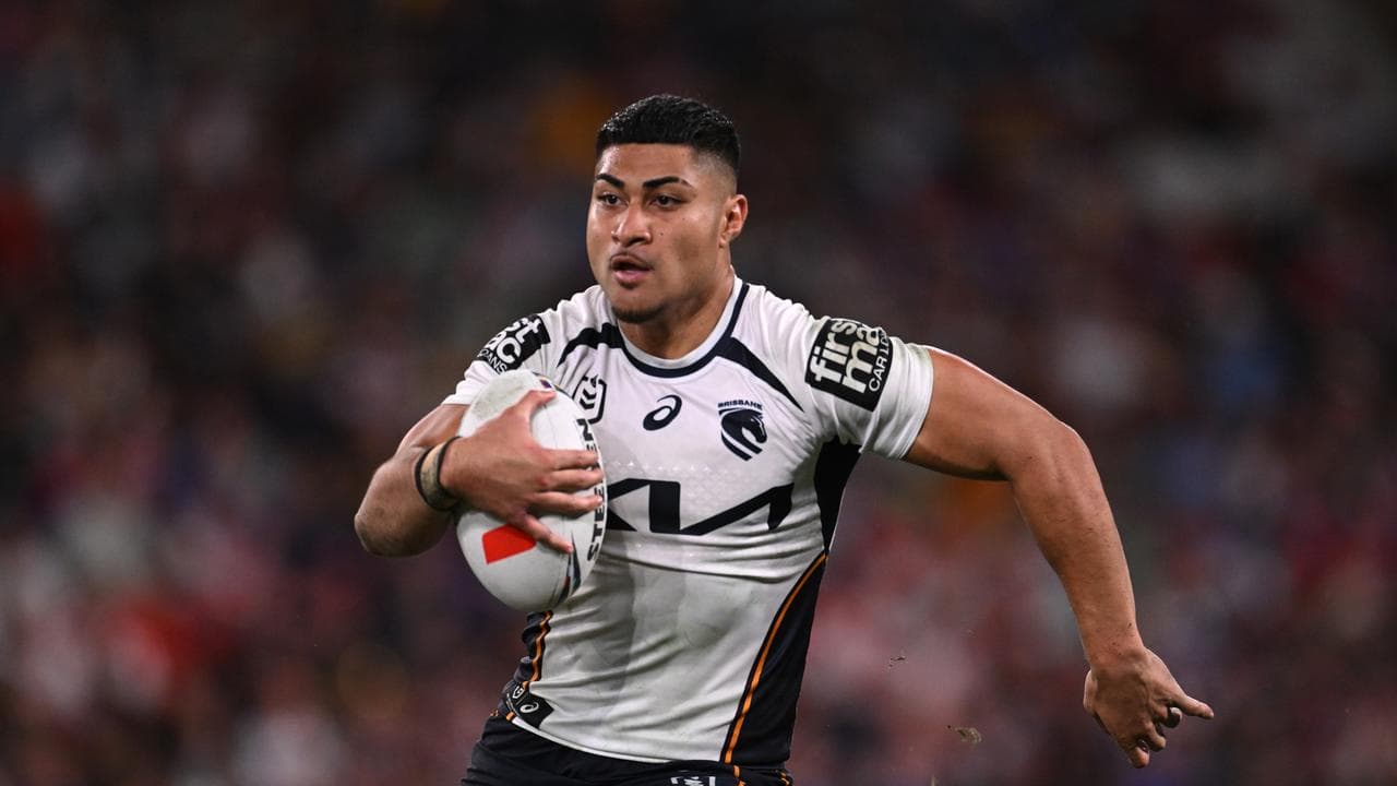 Karapani in Broncos jersey