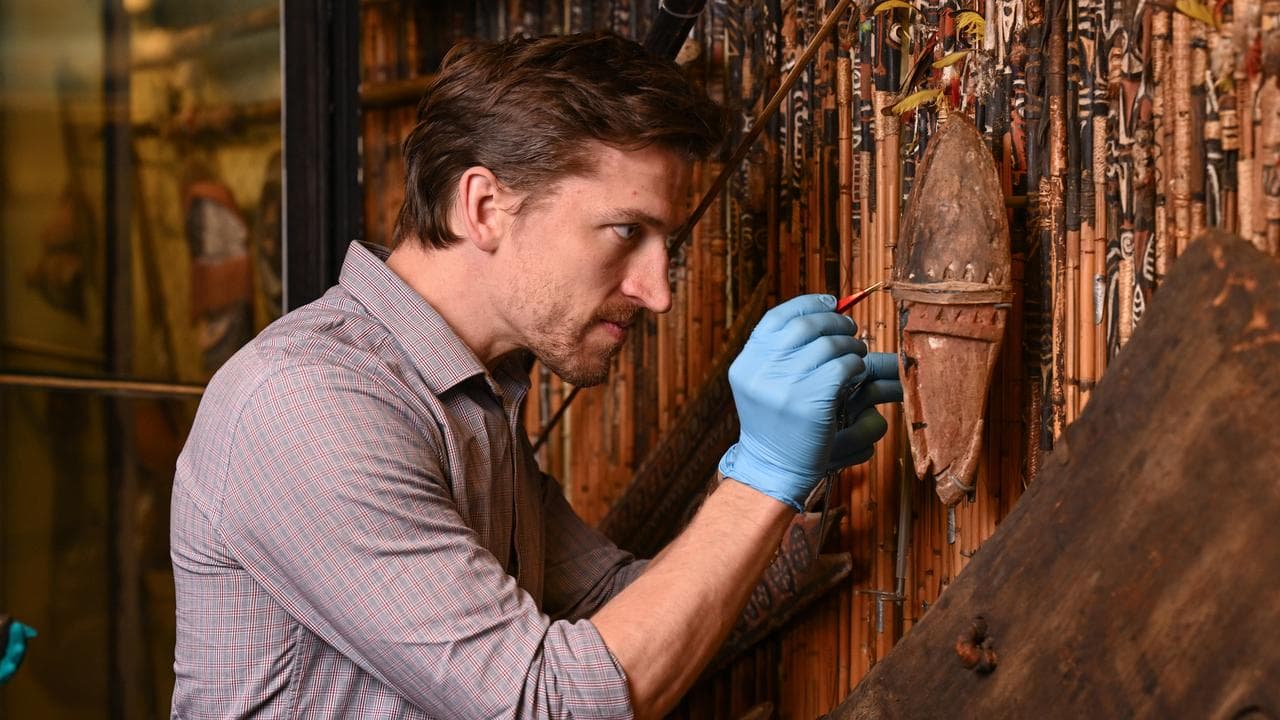 Joshua Brown working on artefacts