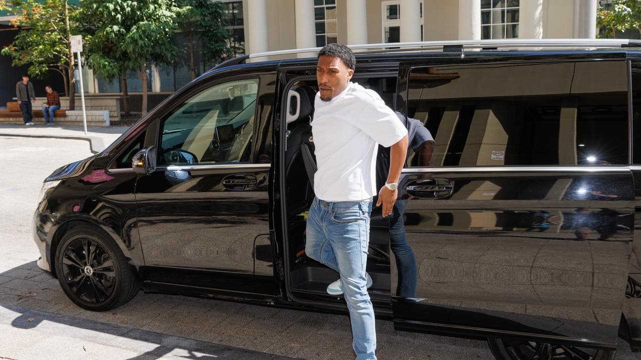 Barrientos steps out of van
