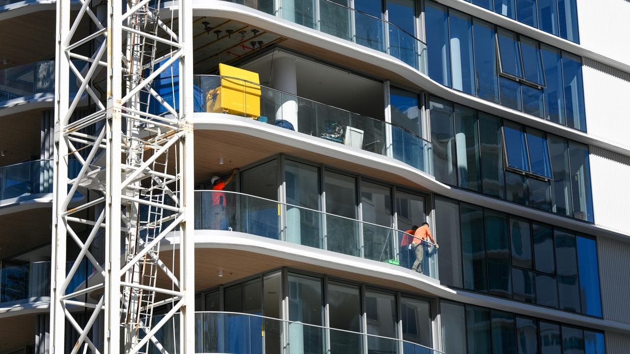 Workers at apartments for sale and under construction