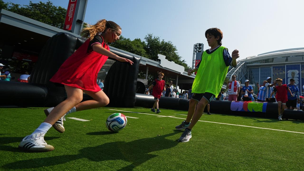 Children playing soccer.