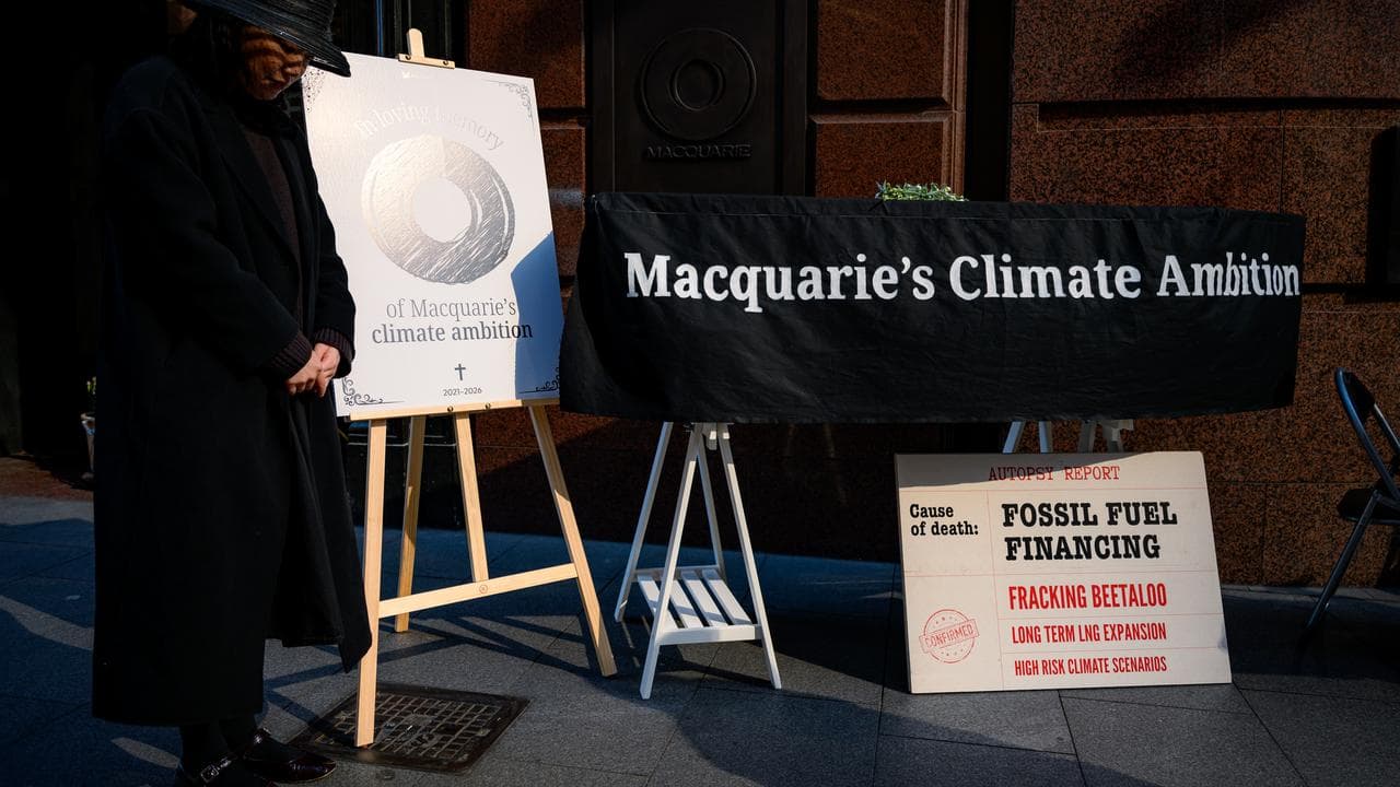 A protester outside the Macquarie Group headquarters