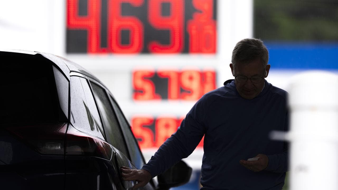 Fuel prices are displayed outside a gas station in Washington, DC