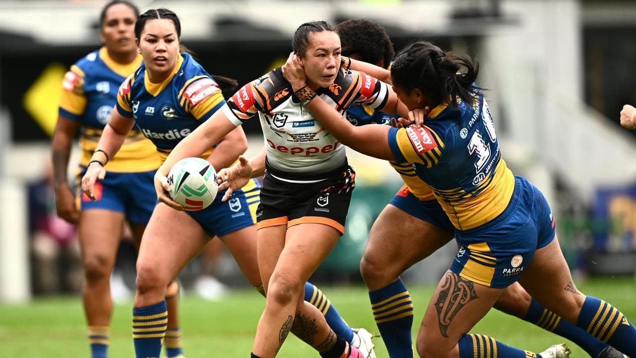 Rae McGregor looks to offload the ball