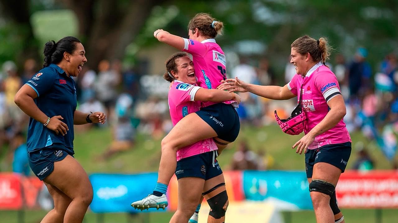 Celebrating NSW Waratahs players.