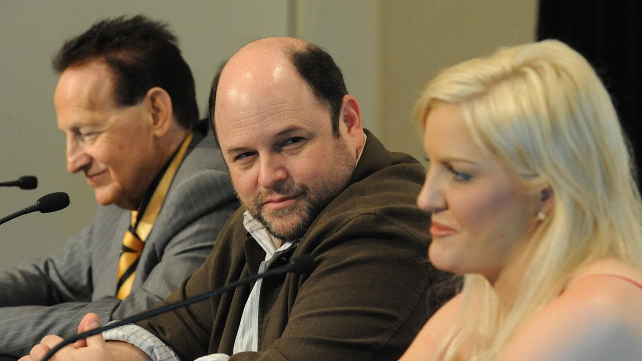 Jason Alexander looking at Brynne Edelsten nee Gordon