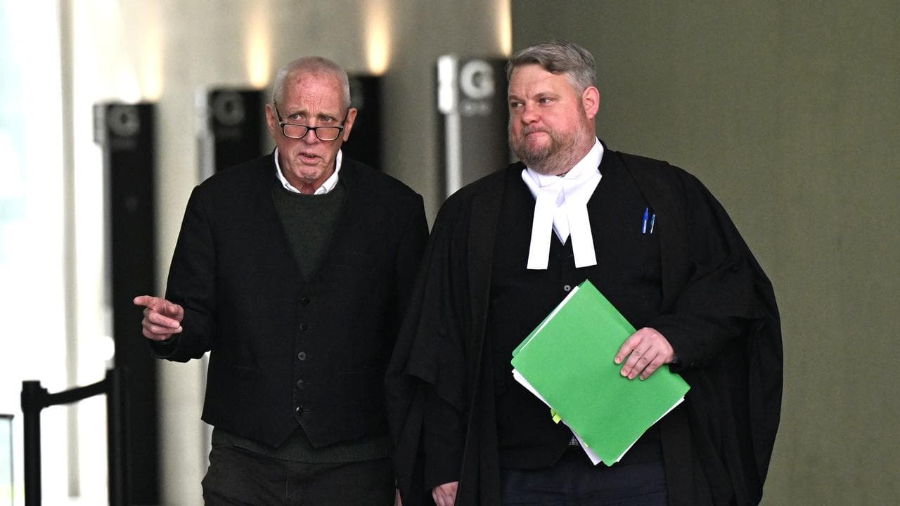 Defence barristers Damian Walsh (left) and John Cook (right)