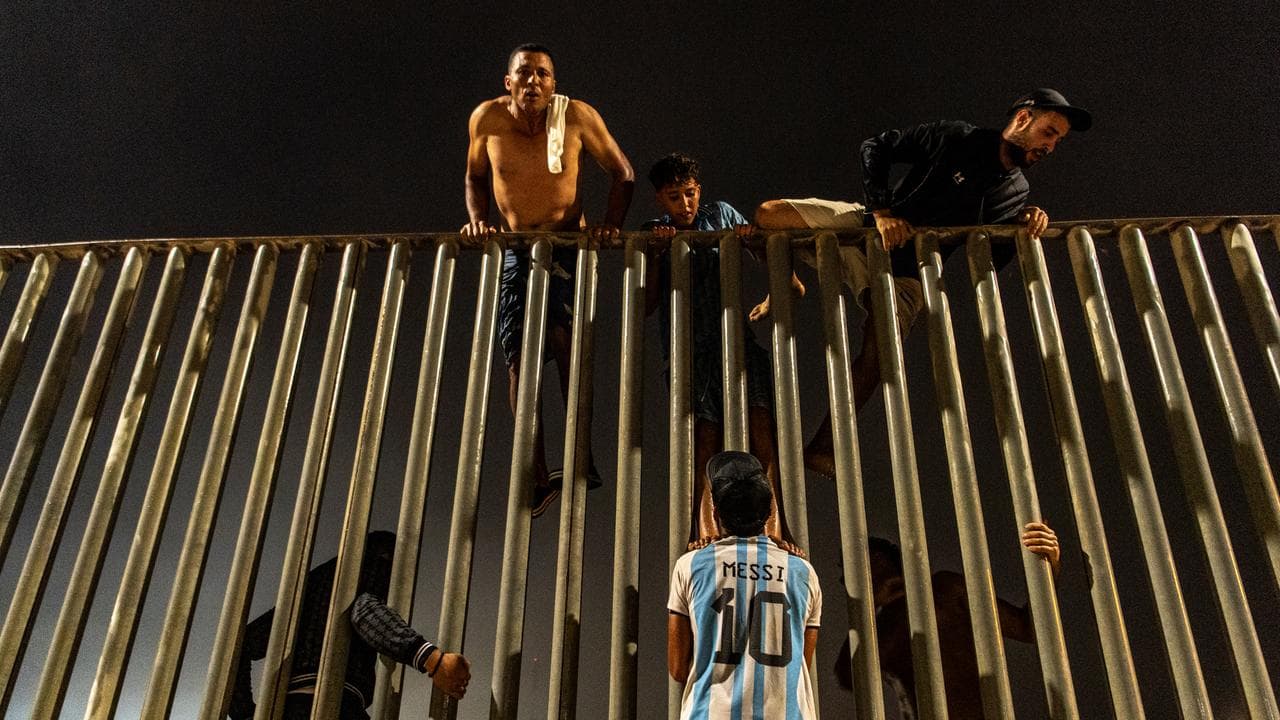 Migrants try to cross from Morocco into the Spanish enclave of Ceuta