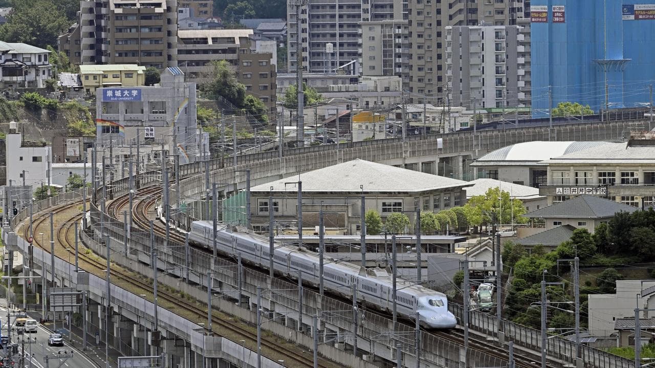 A Kyushu Shinkansen train departs Kumamoto Station
