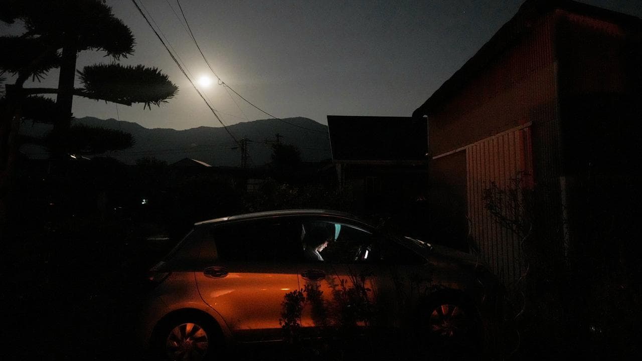 A mother and her daughter live in their car in Yatsushiro, Japan