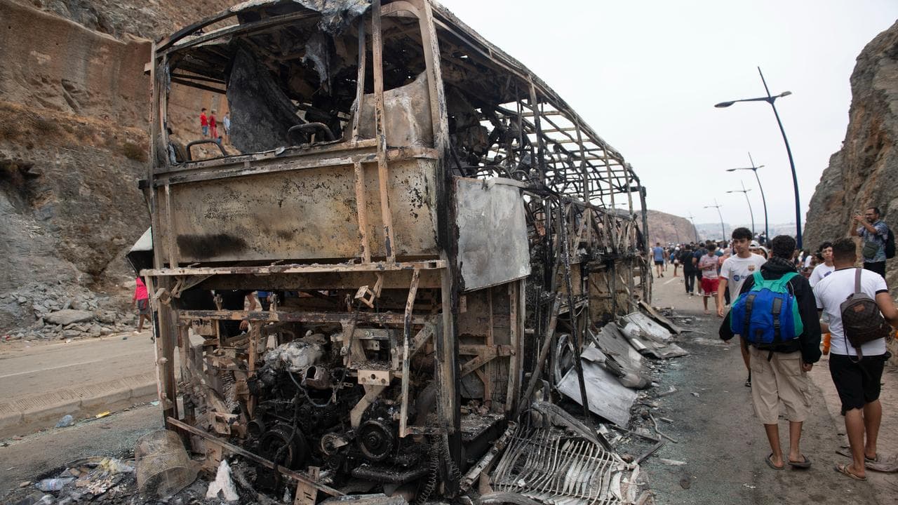 Burned bus after unrest on the Morrocan side of the border with Ceuta