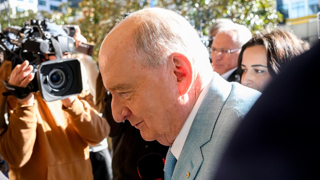 Alan Jones with media
