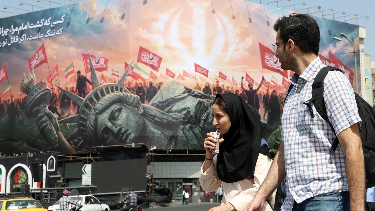 Anti-US billboard at Enghelab Square in central Tehran, Iran