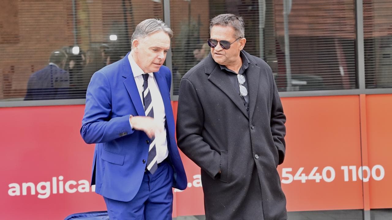 Dermot Dann and Nicky Winmar