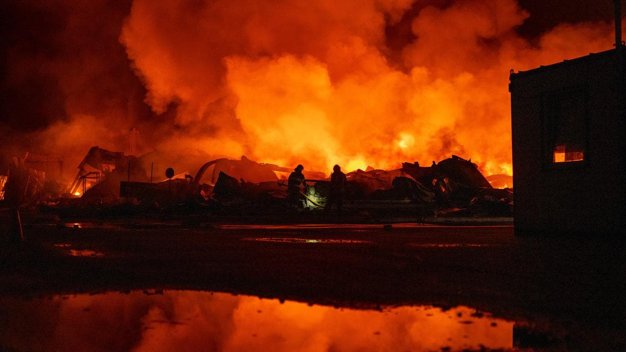 A fire after Russian missiles hit a warehouse in Kyiv, Ukraine