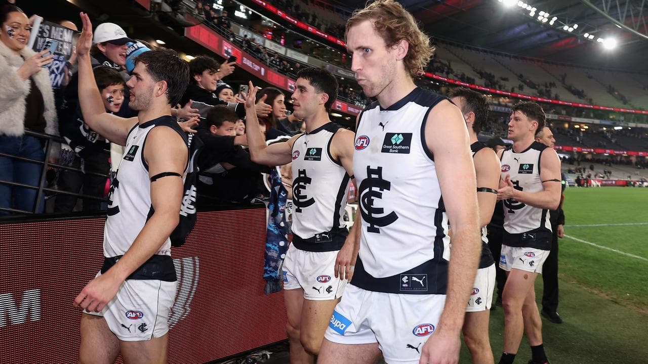 Carlton players celebrate victory over St Kilda