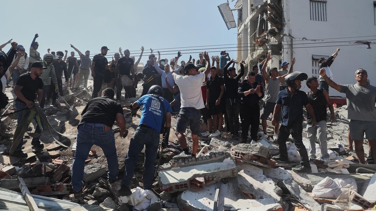 Rescuers trying to free people