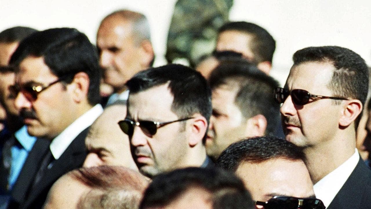 Bashar Assad, right, and his brother Maher Assad