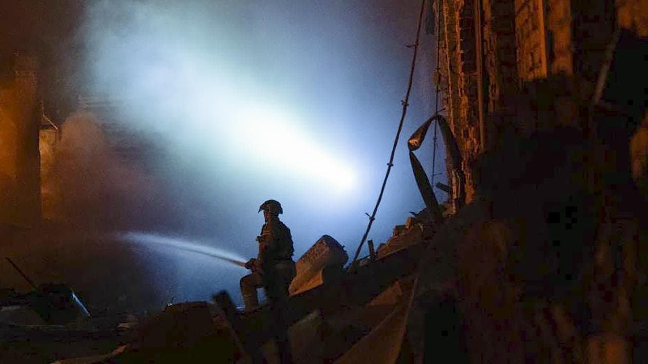 Kyiv rescuers work at site of attack