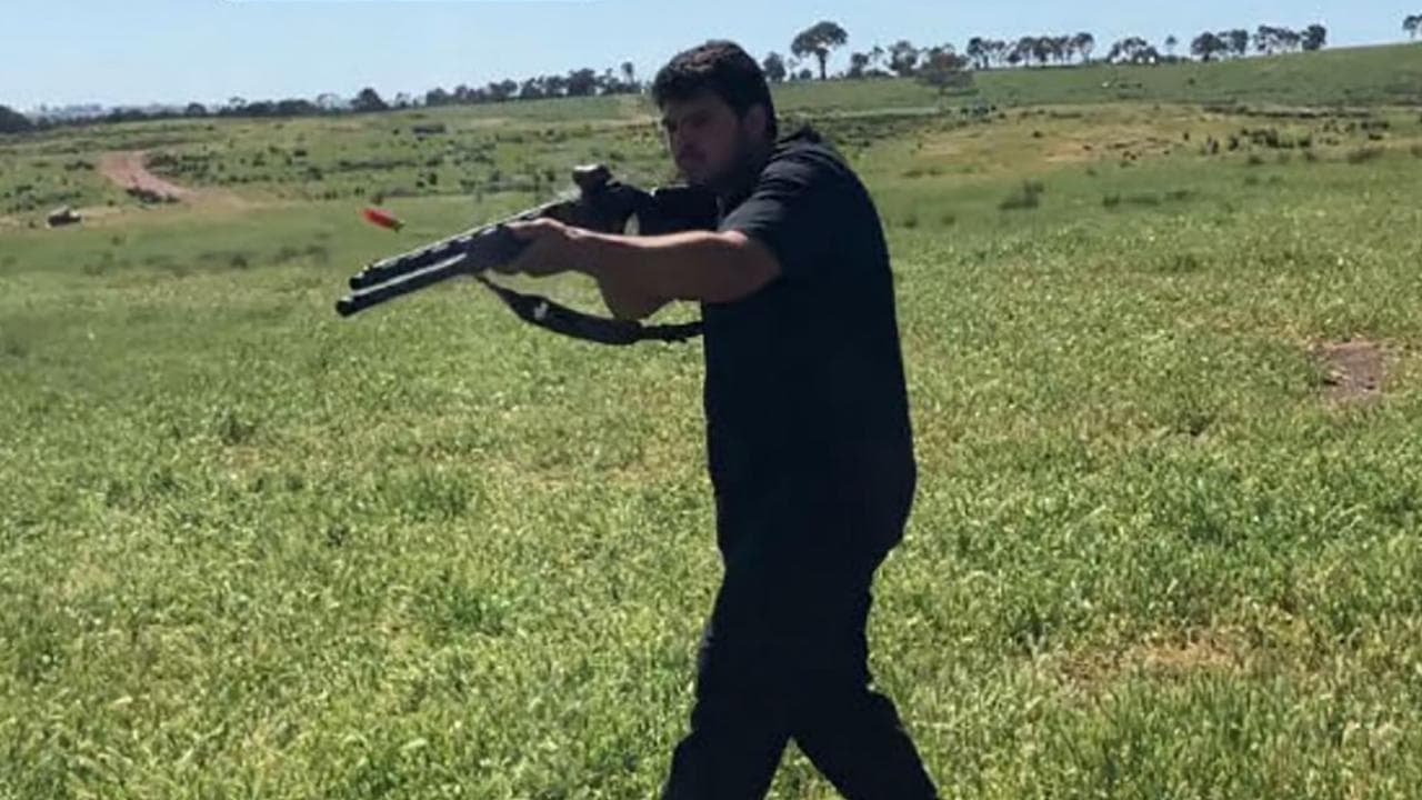 Naveed Akram with gun