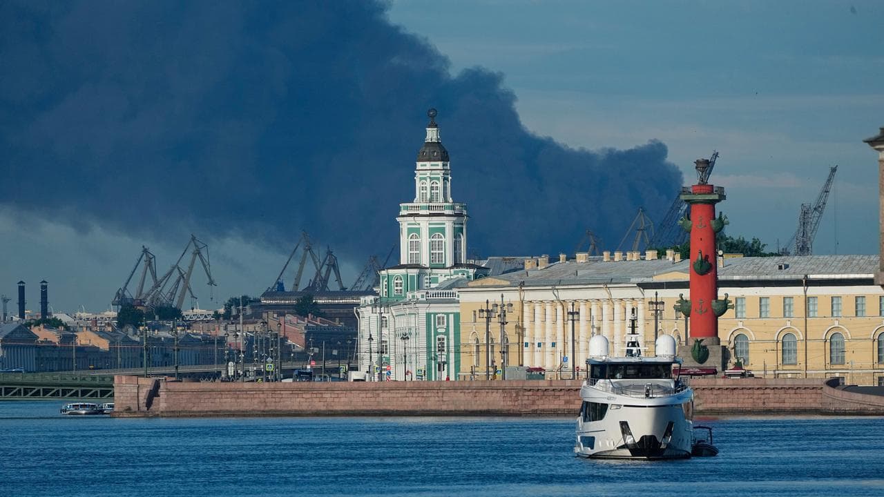 A plume of black smoke over the port of St Petersburg, Russia
