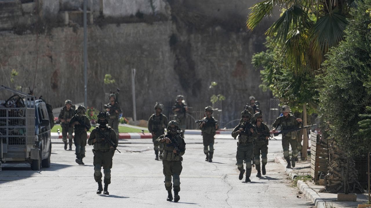 Israeli troops in Qusra