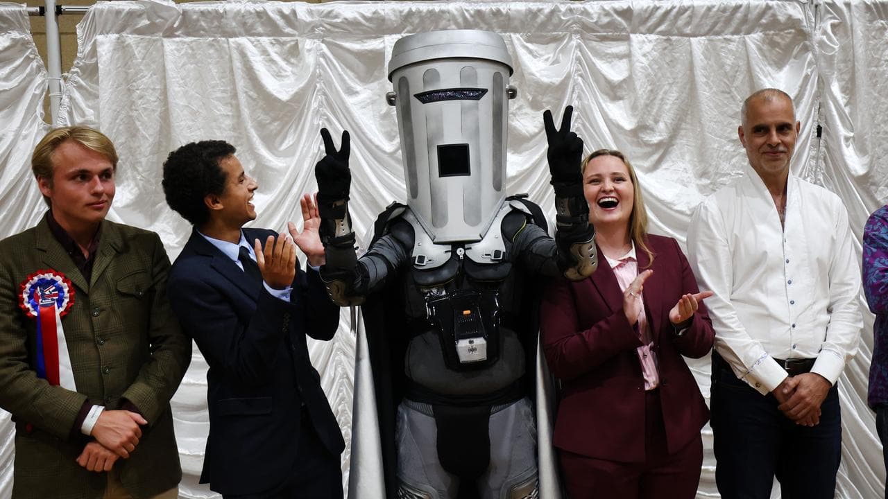 Count Binface celebrates at the Clacton by-election count