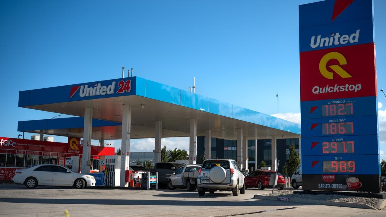 Motorists fill their vehicles with petrol