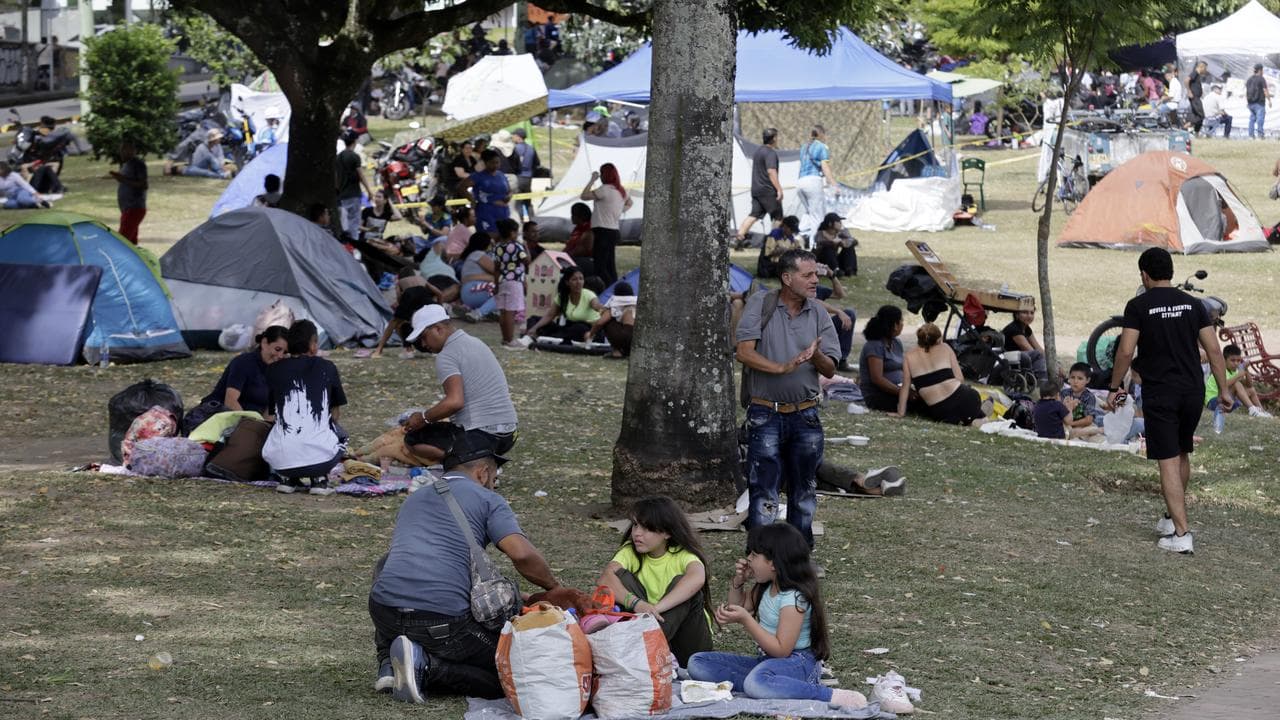 People affected by a quake camp at Olaya Herrera Park in Pereira