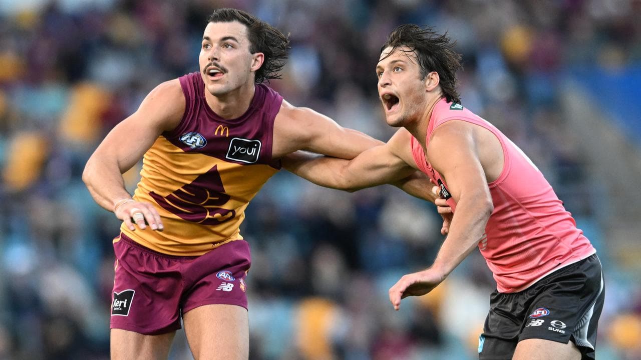 Brisbane's Sam Draper and the Suns' Ned Moyle.