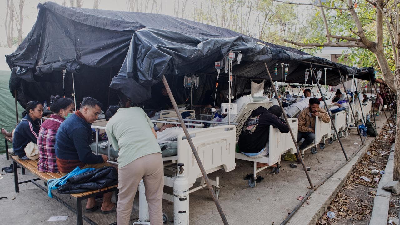 Patients are treated inside a tent in East Nusa Tenggara Province