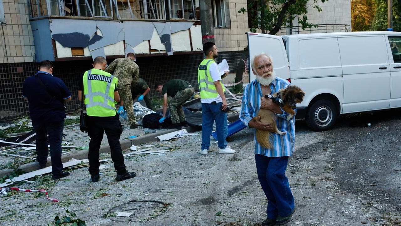 People after an overnight Russian attack in Kyiv, Ukraine