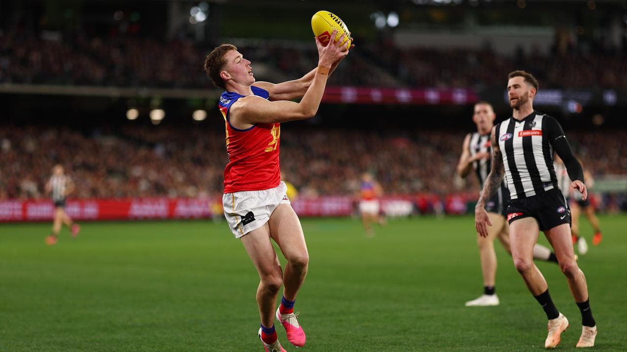 Logan Morris of the Lions marks