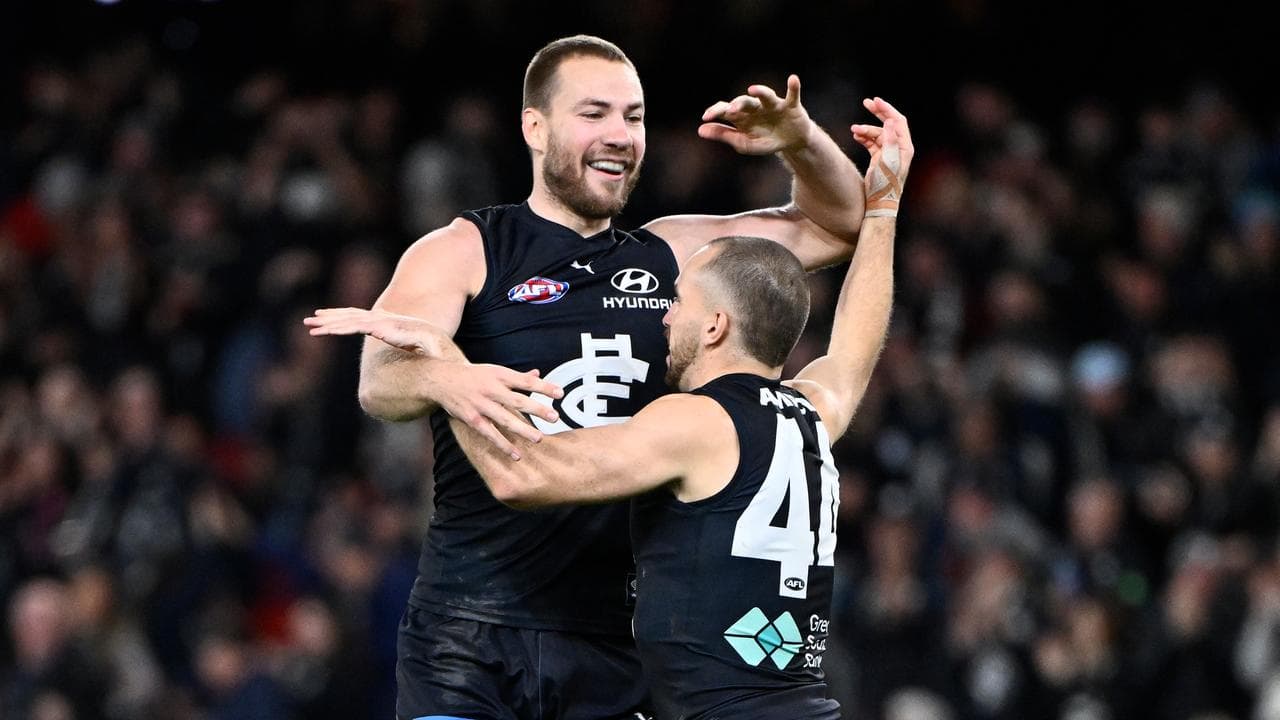 Harry McKay congratulates Francis Evans.