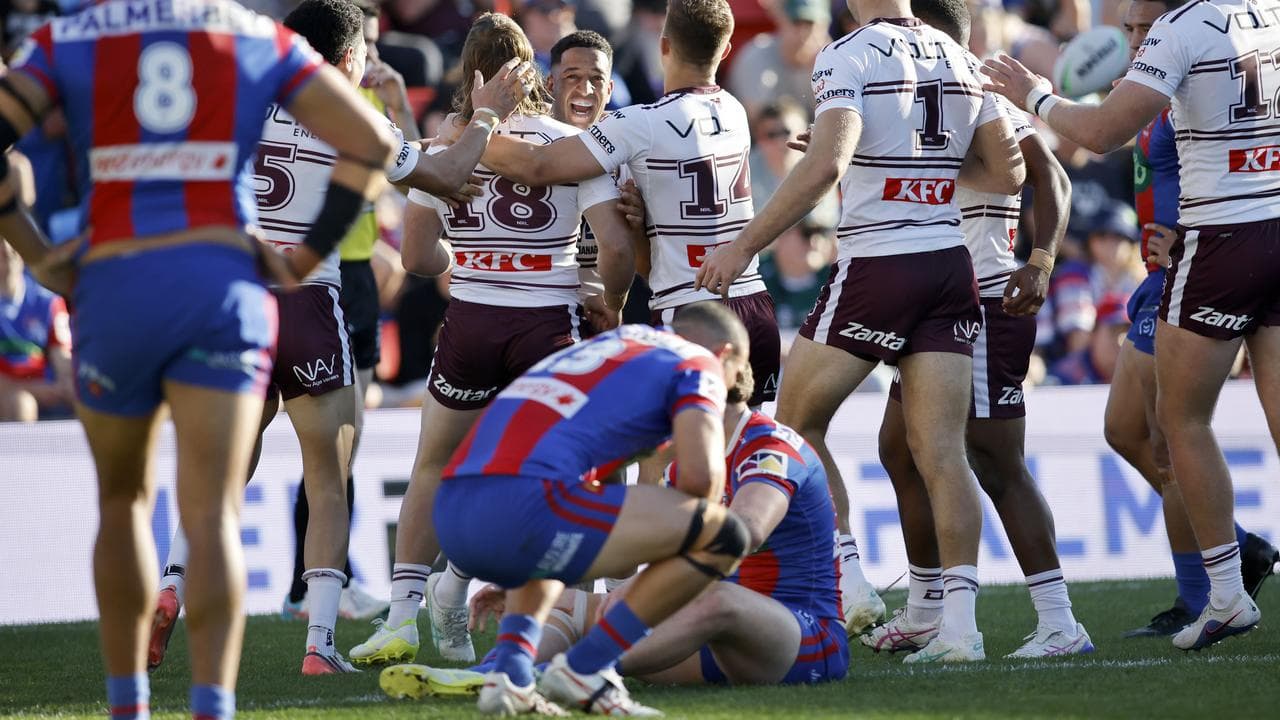 Celebrating Manly players.