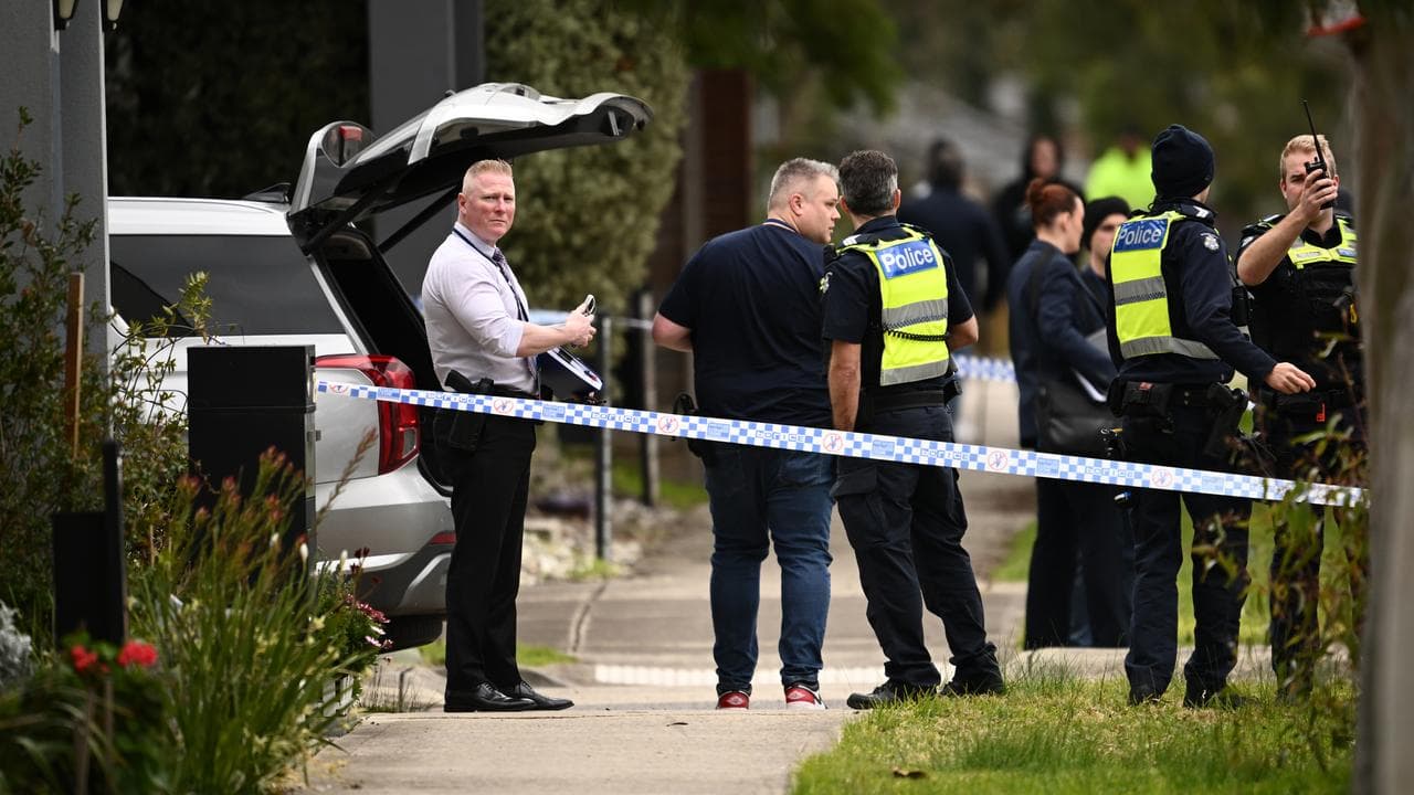 Police establish a crime scene after a fatal shooting at Wollert