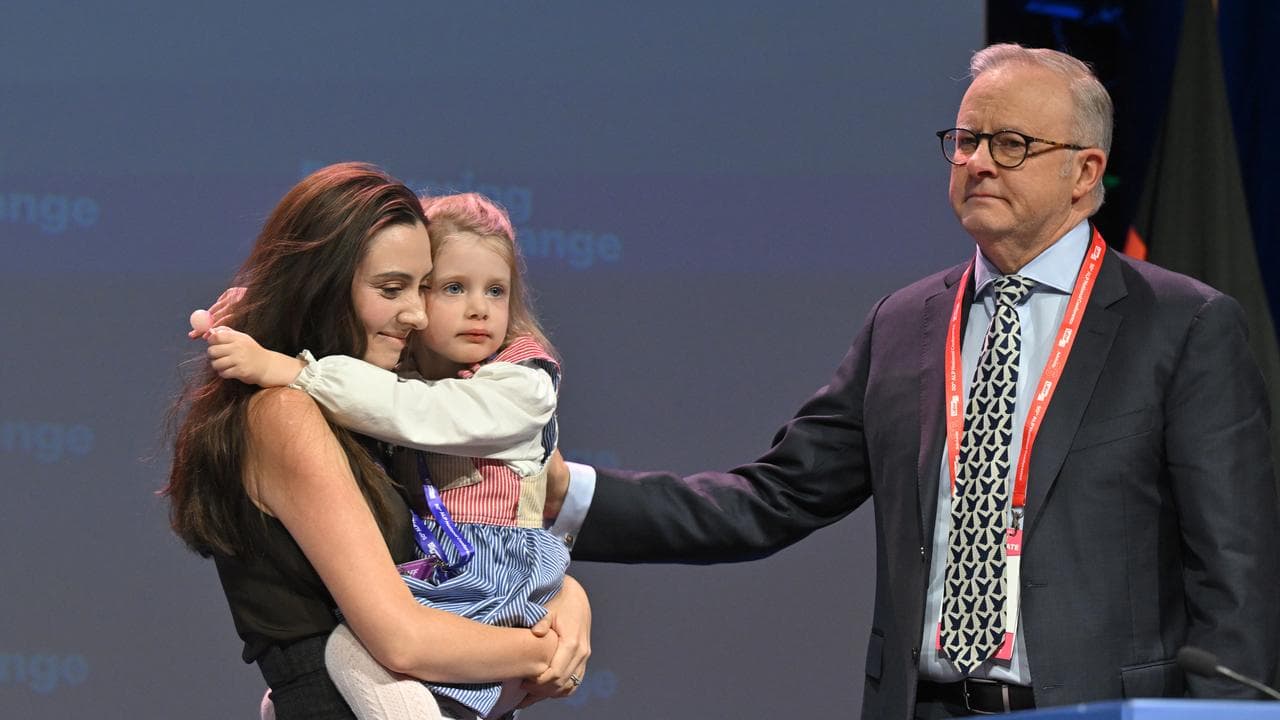 Priya Brown, with daughter in arms, alongside Anthony Albanese